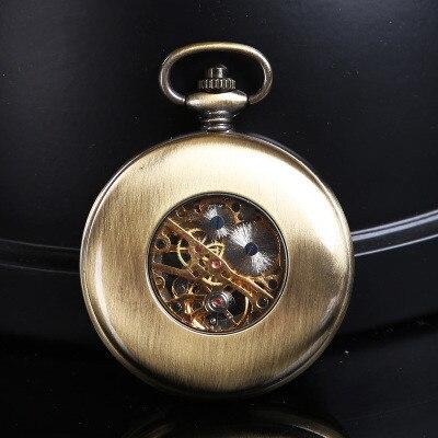 Montre à gousset mécanique à remontage manuel, capot avant décoré de pierres vertes et arabesques Ma montre à gousset