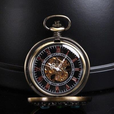 Montre à gousset mécanique à remontage manuel, capot avant décoré de pierres vertes et arabesques Ma montre à gousset